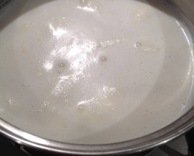 Frothy milk just before boiling point.